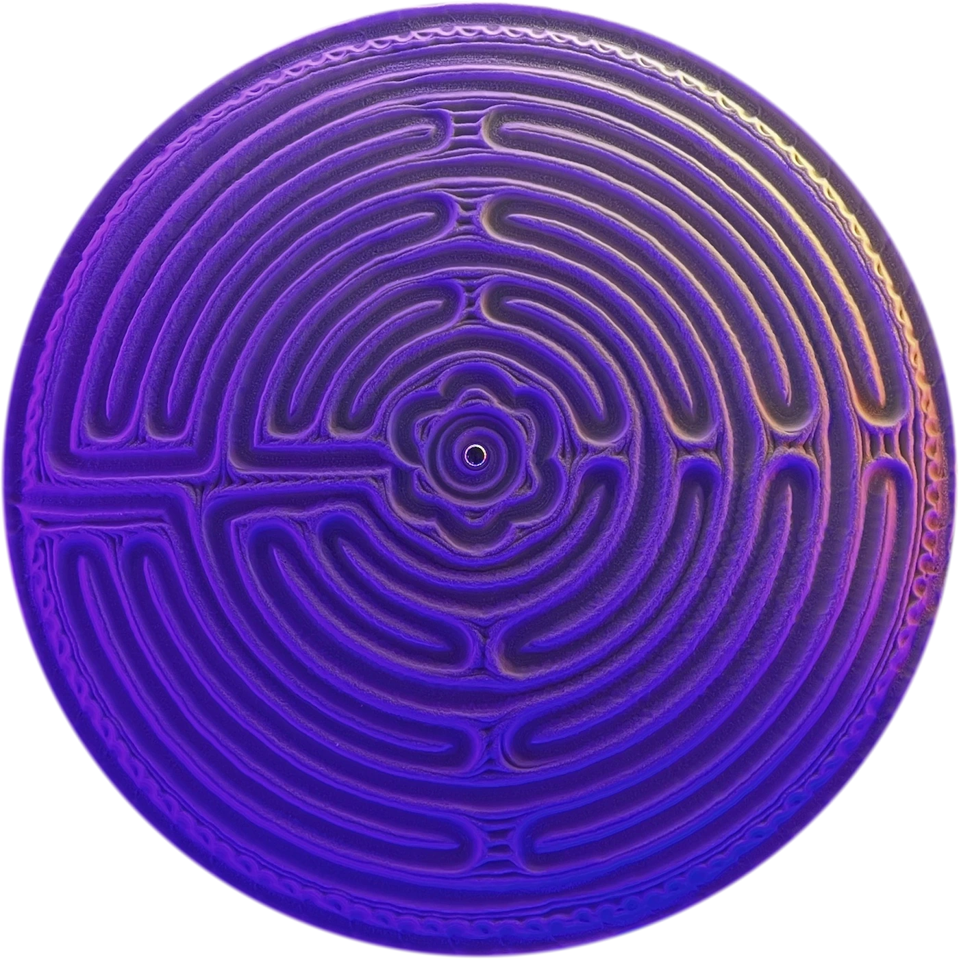 Labyrinth pattern traced in sand